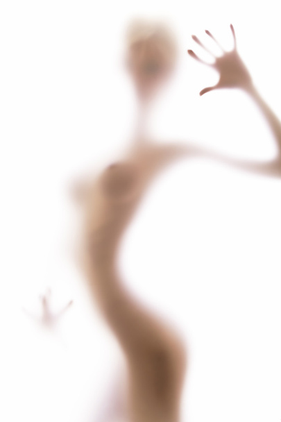Sexy body behind the blurred glass - Valokuva, kuva
