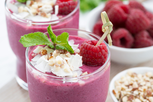 fresh berry smoothies with nuts, closeup - Foto, Imagen