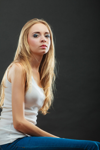 portrait of blonde long hair girl on black - Foto, Imagem