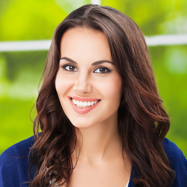 happy smiling young brunette woman - Photo, image