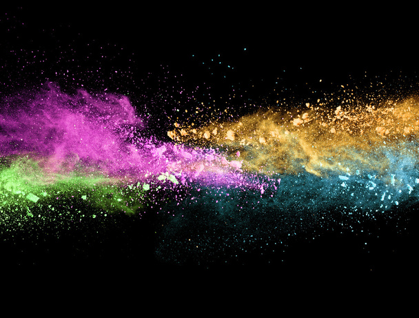 Explosion of colored powder on black background - Fotoğraf, Görsel