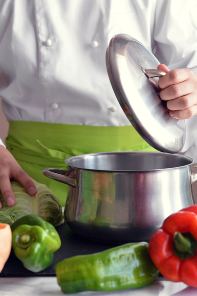 Chef cutting vegetables  - Zdjęcie, obraz