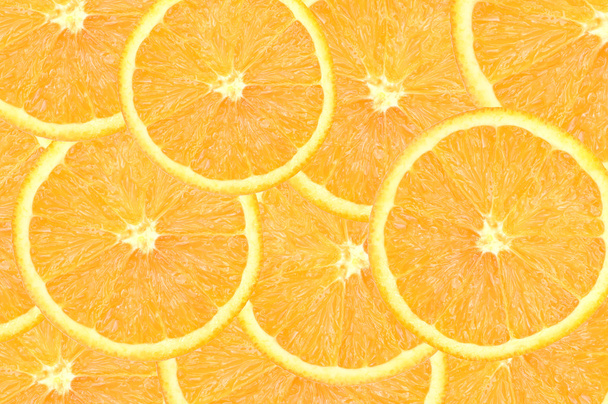 Wallpaper with orange slices. Collage of oranges - Foto, Imagen