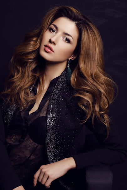 gorgeous woman with dark hair and evening makeup, wears elegant dress   - Fotografie, Obrázek
