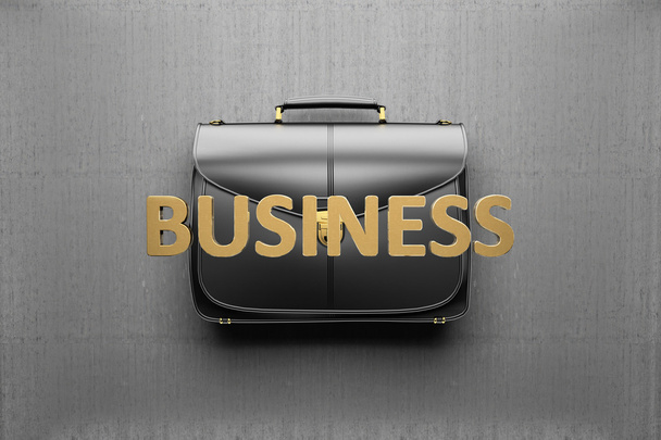 Briefcase on the background of gray concrete wall. Business conc - Photo, Image