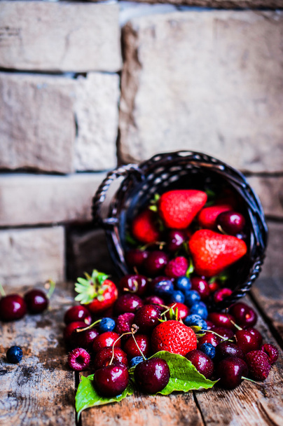 Berries mix on rustic background - Zdjęcie, obraz