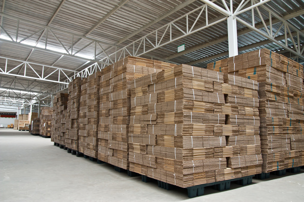 Stack of folded paper box in warehouse - Photo, Image