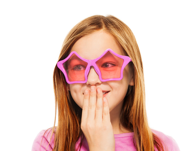 Funny giggling girl in glasses with star frames - Photo, Image
