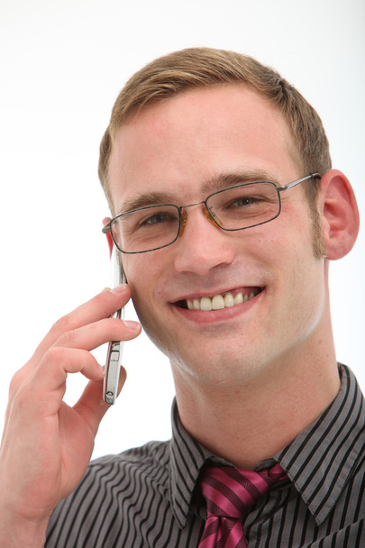 Smiling friendly man on mobile phone - Foto, Bild