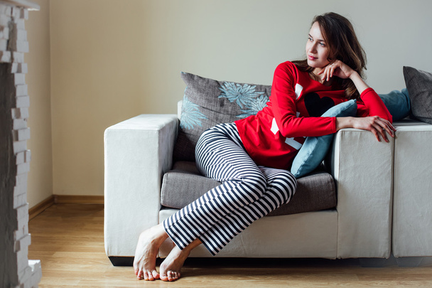 young woman relaxing in pyjamas  - Foto, Bild
