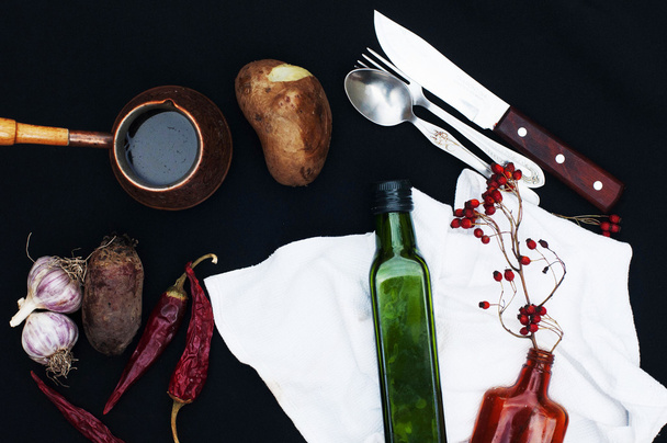 Breakfast, red berry, potatoes, red dry peppers, food background - Fotó, kép