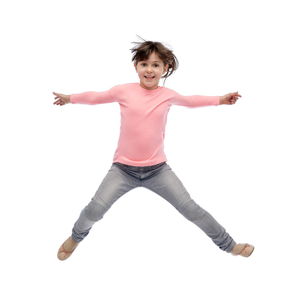 happy little girl jumping in air - 写真・画像
