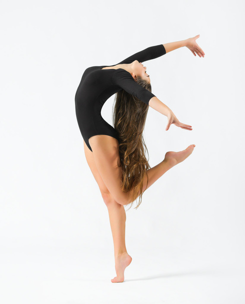Young girl engaged art gymnastic - 写真・画像