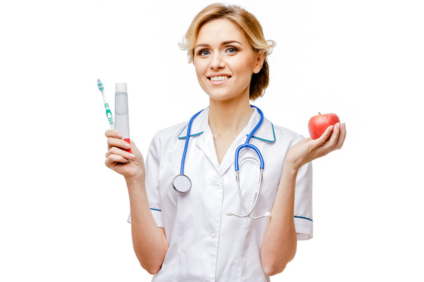 Woman doctor standing on white background - Valokuva, kuva