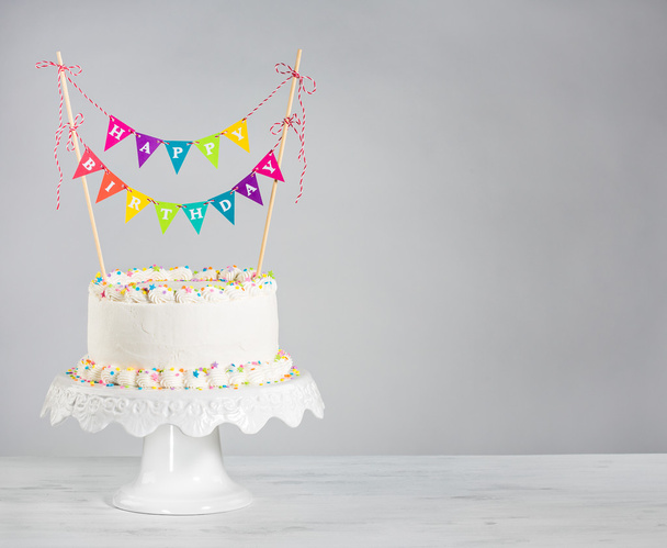 White Birthday Cake colorful bunting - Φωτογραφία, εικόνα