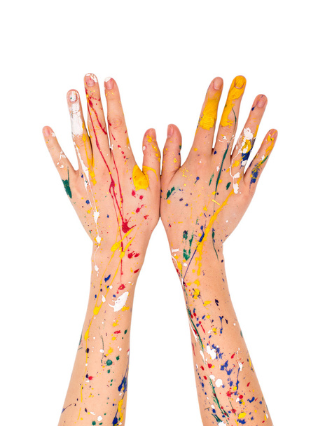 Руки жінки в фарбі роблять вільну форму
 - Фото, зображення