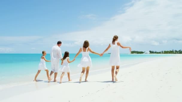 Caucasian family enjoying beach vacation - Footage, Video