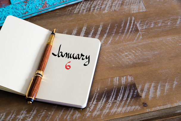 6 de janeiro Calendário Dia manuscrito no notebook
 - Foto, Imagem