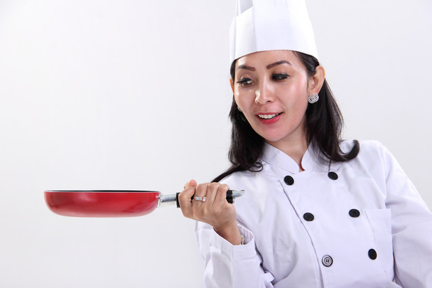 Kobieta kucharz i jej patelni - Zdjęcie, obraz