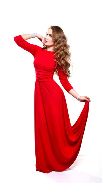 Young beauty woman in red dress. - Fotoğraf, Görsel