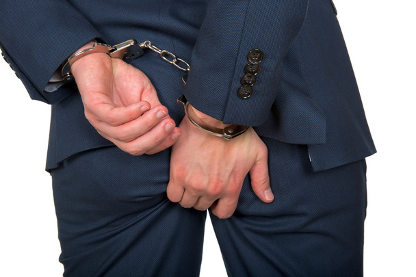 A handcuffed hand - Zdjęcie, obraz