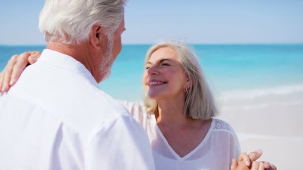 senior couple dancing on a tropical beach - Footage, Video