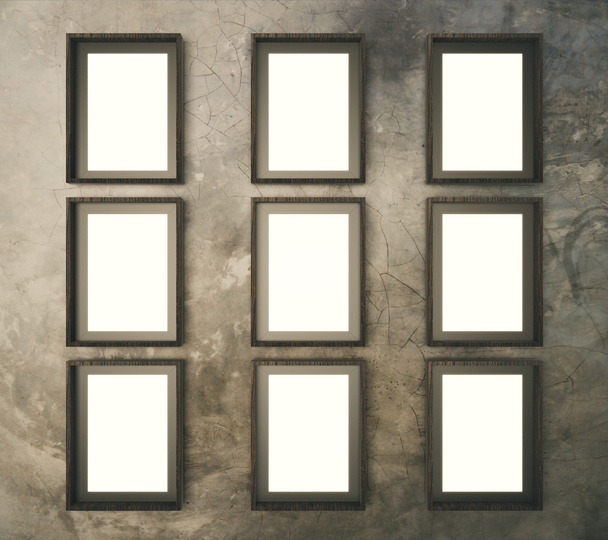Blank brown picture frames on brown concrete wall, mock up - Fotó, kép