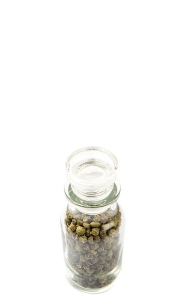 Granos de pimienta verde en frasco de vidrio
 - Foto, imagen