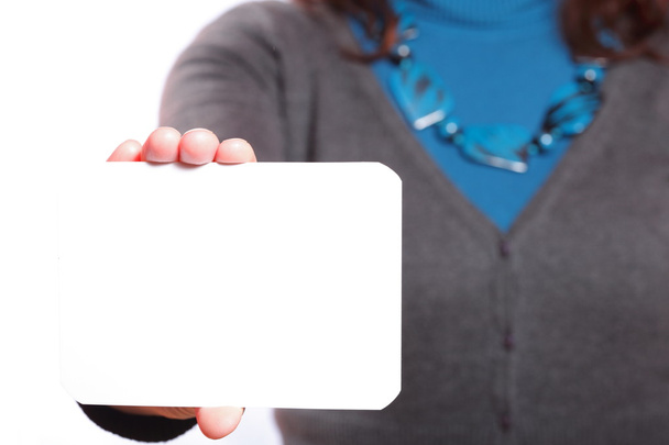 Blank of business card in woman hand - Valokuva, kuva