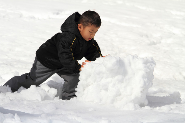 Japanese boy making snowman (4 years old) - Photo, Image