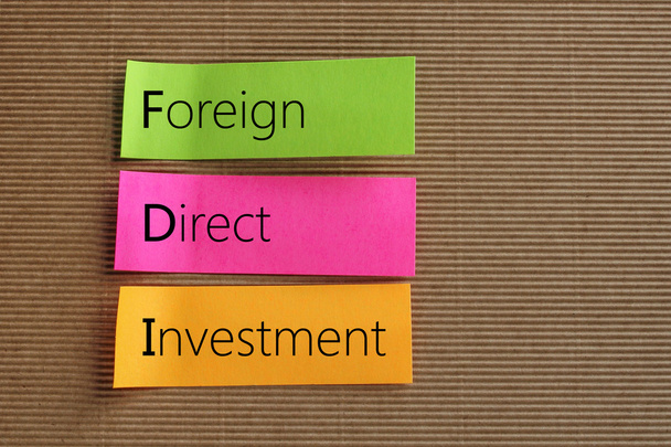 Buitenlandse directe investeringen (BDI) tekst op kleurrijke kleverige nota 's - Foto, afbeelding