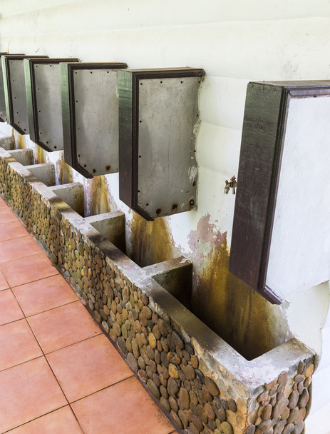 Dirty urinals row - Photo, Image