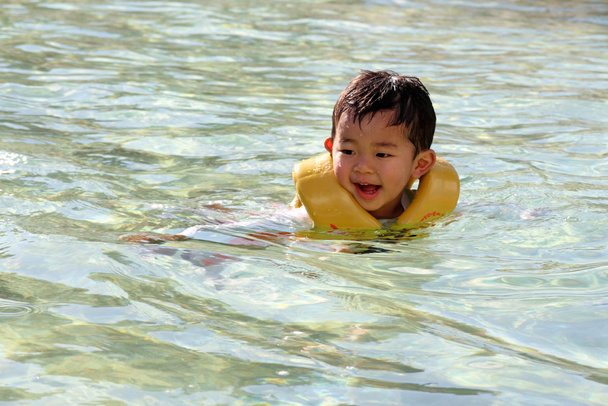 Japanese boy swiming in the pool (2 years old) - Photo, Image