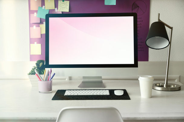 Stylish workplace with computer - Фото, зображення
