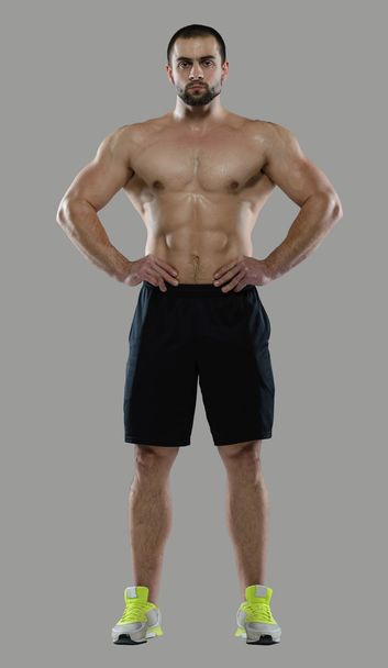 Great workout. Portrait of muscular professional bodybuilder - Фото, зображення