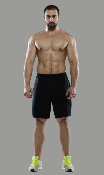 Great workout. Portrait of muscular professional bodybuilder - 写真・画像
