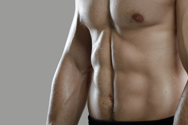 Great workout. Portrait of muscular professional bodybuilder - Zdjęcie, obraz