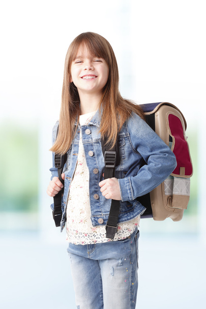 girl with backpack smiling - Фото, изображение