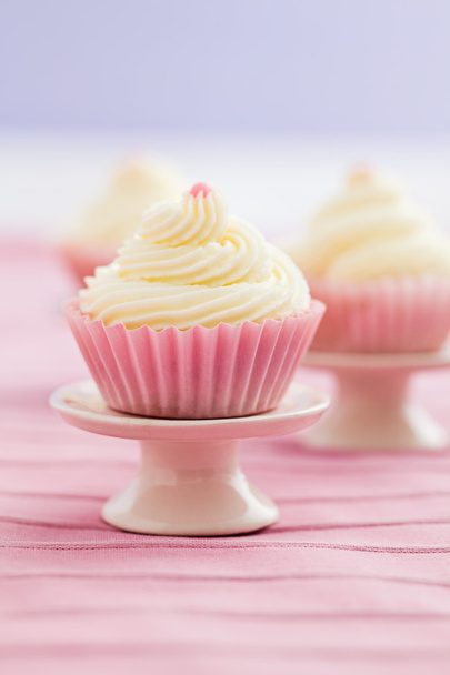 Three vanilla cupcakes - Фото, зображення