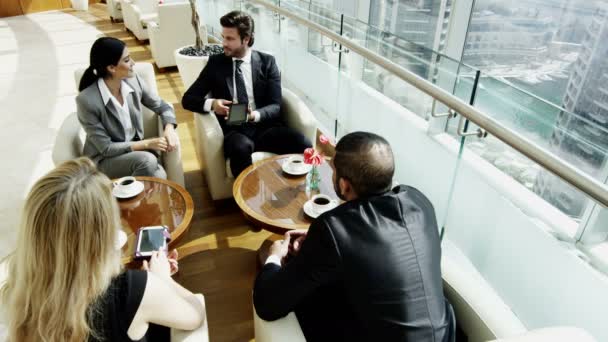 business team having meeting in Dubai office building - Πλάνα, βίντεο