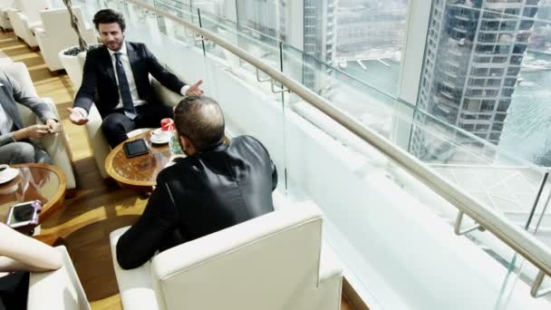 business team having meeting in Dubai office building - 映像、動画