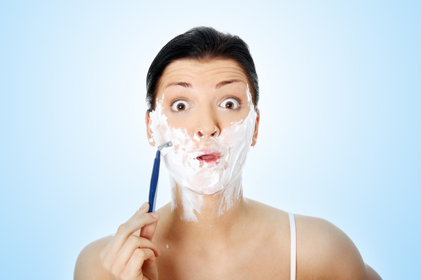 Young woman have shave - 写真・画像