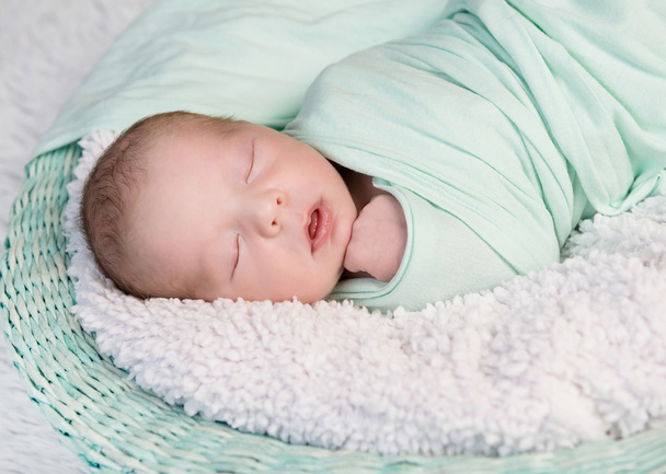 sweet wrapped in a nappy newborn baby - Fotó, kép