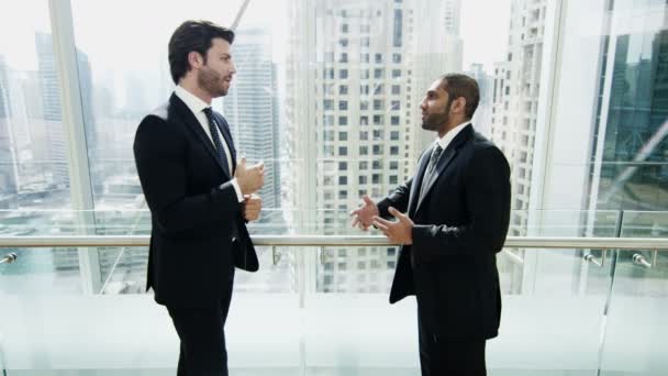 businessmen meeting in Dubai modern office building - Materiał filmowy, wideo