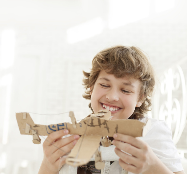 teenager with model airlplane - Photo, Image