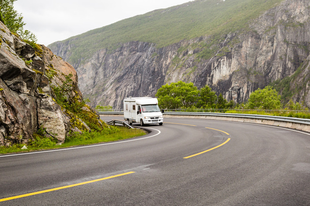 Campervan driving on Hardangervidda road in Norway - Фото, изображение