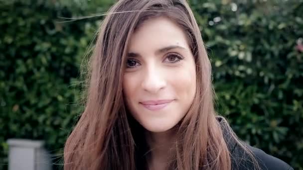 Beautiful smiling young woman looking camera fresh with joy - Felvétel, videó