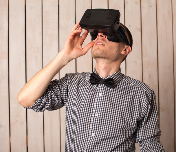 Man in VR glasses - Фото, изображение
