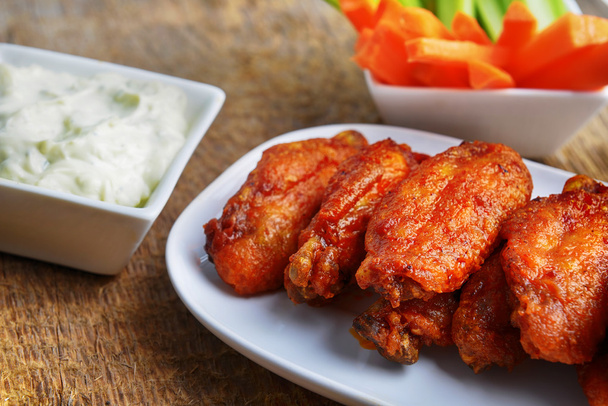 Chicken wings with celery and carrot - Photo, Image