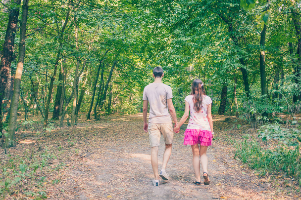 Couple walking in the park - Photo, Image